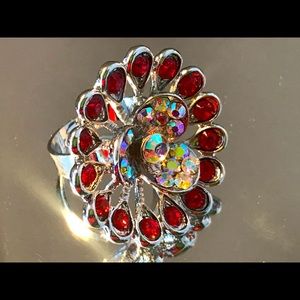 A faux ruby red expandable ring